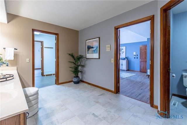 2325 Saint Roberts Ln, Toledo, OH 43617 - bathroom with toilet and double vanity