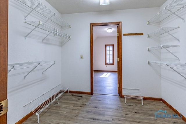 2325 Saint Roberts Ln, Toledo, OH 43617 - walk in closet featuring wood finished floors