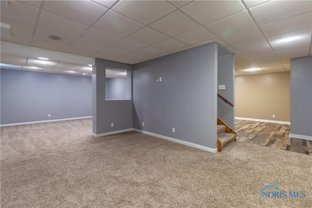 2325 Saint Roberts Ln, Toledo, OH 43617 - finished below grade area with carpet, a paneled ceiling, and stairway