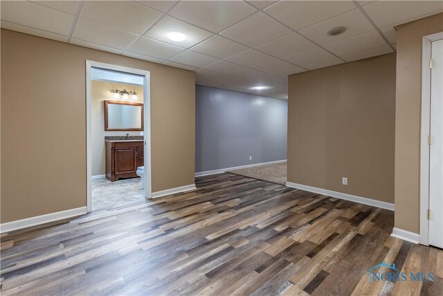 2325 Saint Roberts Ln, Toledo, OH 43617 - spare room with wood finished floors and a paneled ceiling