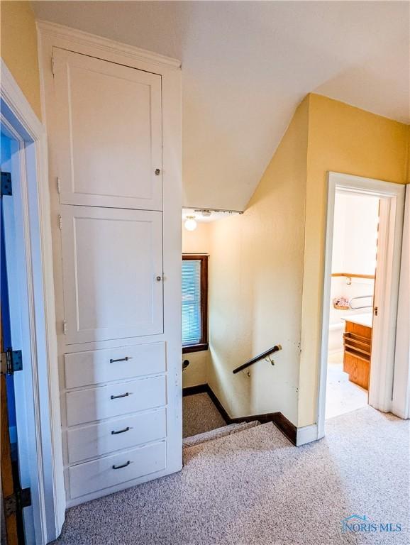 120 Elm St, Fostoria, OH 44830 - stairway featuring carpet and baseboards