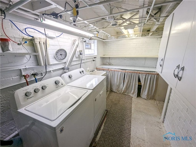 120 Elm St, Fostoria, OH 44830 - laundry room with cabinet space and washer and clothes dryer