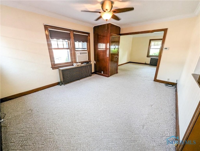 120 Elm St, Fostoria, OH 44830 - empty room with radiator, ornamental molding, light colored carpet, ceiling fan, and cooling unit