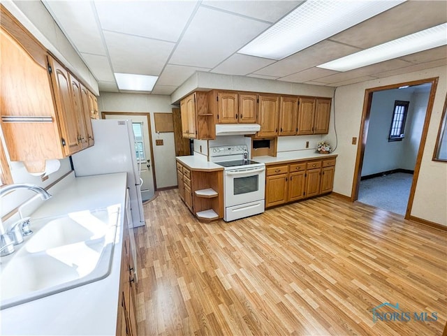 120 Elm St, Fostoria, OH 44830 - kitchen featuring white appliances, under cabinet range hood, open shelves, brown cabinetry, and light wood finished floors