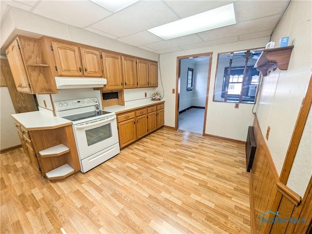 120 Elm St, Fostoria, OH 44830 - kitchen featuring electric stove, open shelves, under cabinet range hood, light wood-style flooring, and light countertops