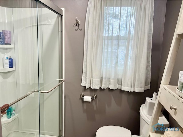 3822 Sylvan Wood Dr, Sylvania, OH 43560 - bathroom featuring toilet and a stall shower