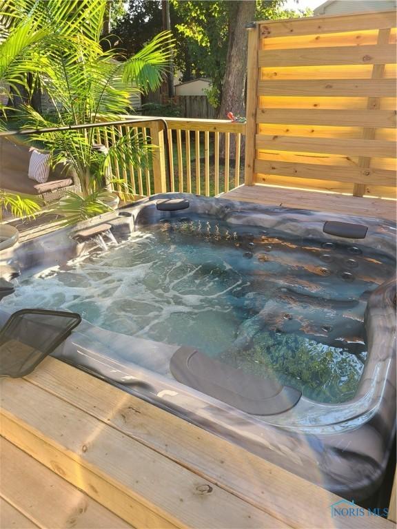 3822 Sylvan Wood Dr, Sylvania, OH 43560 - view of swimming pool with an outdoor hot tub