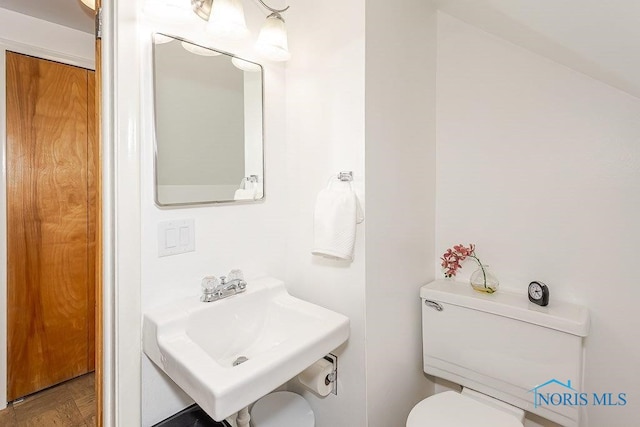 921 7th St, Maumee, OH 43537 - half bath with toilet and a sink