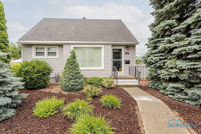 921 7th St, Maumee, OH 43537 - view of front of property with roof with shingles