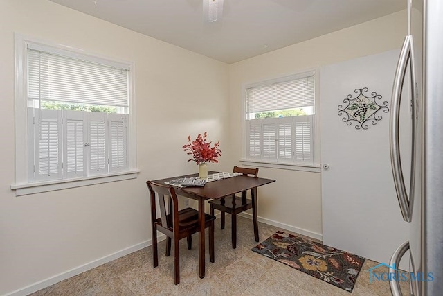 921 7th St, Maumee, OH 43537 - dining area featuring baseboards