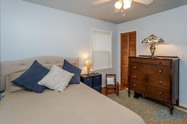 921 7th St, Maumee, OH 43537 - bedroom with a closet, ceiling fan, and wood finished floors