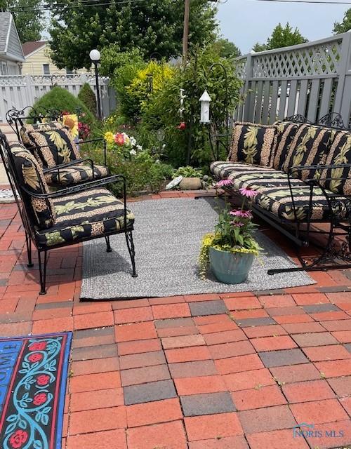 921 7th St, Maumee, OH 43537 - view of patio / terrace with an outdoor living space