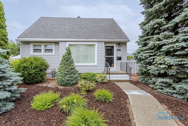 921 7th St, Maumee, OH 43537 - view of front of property featuring roof with shingles