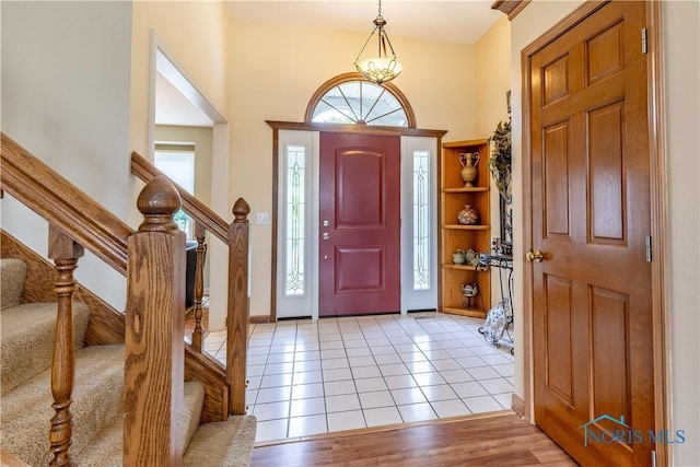 6666 Brick Yard Ct, Maumee, OH 43537 - foyer entrance featuring stairway and light tile patterned floors