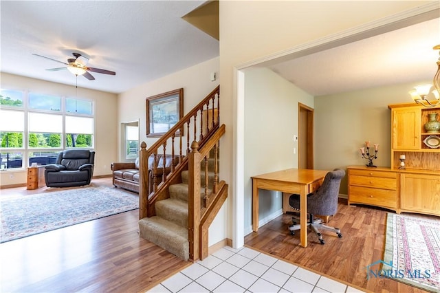 6666 Brick Yard Ct, Maumee, OH 43537 - office area featuring ceiling fan, light wood-style flooring, and a chandelier
