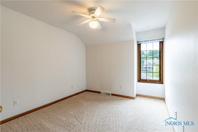 6666 Brick Yard Ct, Maumee, OH 43537 - carpeted spare room featuring ceiling fan and vaulted ceiling