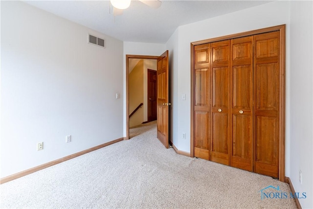 6666 Brick Yard Ct, Maumee, OH 43537 - unfurnished bedroom with light colored carpet, a closet, and ceiling fan