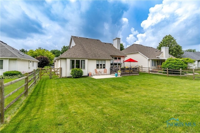 6666 Brick Yard Ct, Maumee, OH 43537 - rear view of house with a patio, a fenced backyard, and roof with shingles