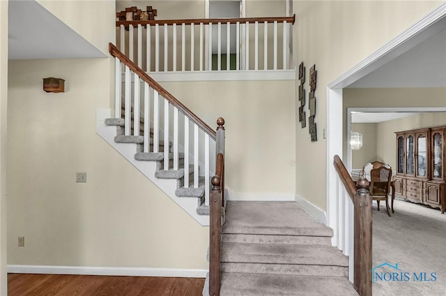 7257 Wembley Ter, Toledo, OH 43617 - stairs featuring baseboards