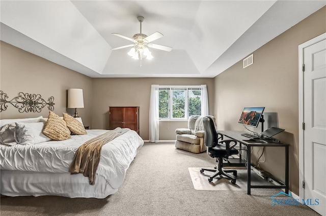 7257 Wembley Ter, Toledo, OH 43617 - bedroom featuring carpet flooring, a tray ceiling, an office area, lofted ceiling, and ceiling fan