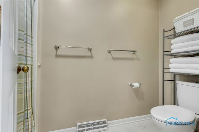 7257 Wembley Ter, Toledo, OH 43617 - bathroom with toilet and baseboards