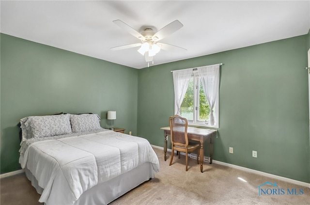 7257 Wembley Ter, Toledo, OH 43617 - carpeted bedroom with baseboards and a ceiling fan