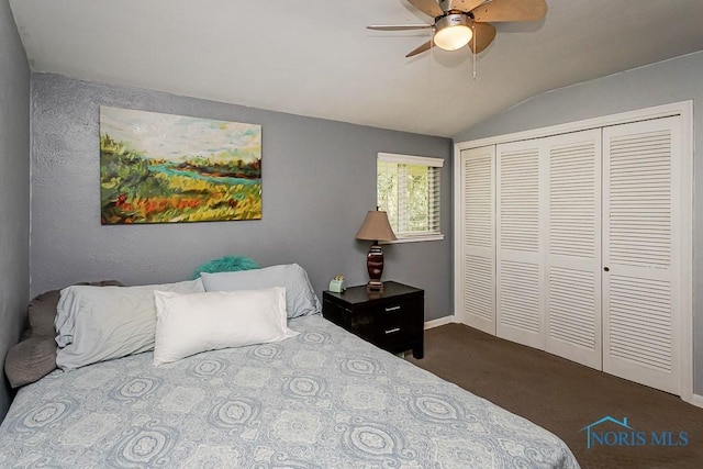 2338 Greenlawn Dr, Toledo, OH 43614 - bedroom featuring vaulted ceiling, dark colored carpet, a closet, and ceiling fan