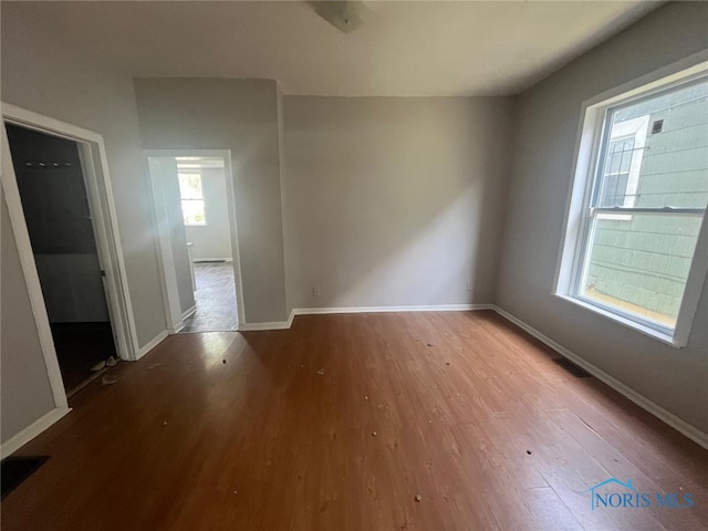 1131 Montrose Ave, Toledo, OH 43607 - spare room with wood finished floors and baseboards