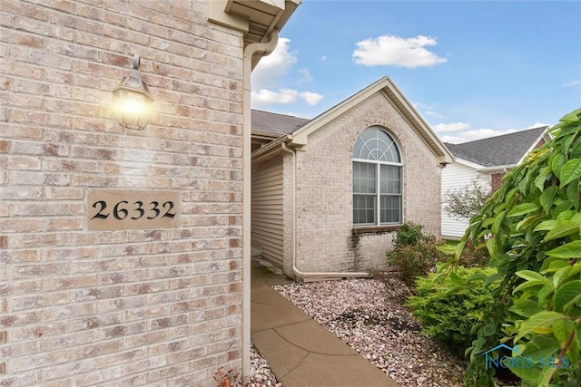 26332 Whitewater Dr, Perrysburg, OH 43551 - view of exterior entry featuring brick siding