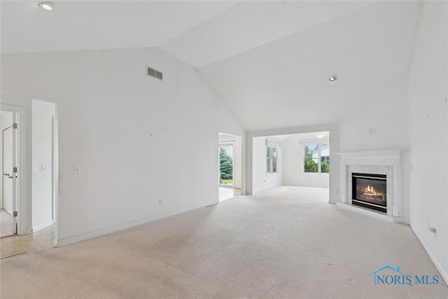 26332 Whitewater Dr, Perrysburg, OH 43551 - unfurnished living room with high vaulted ceiling, carpet flooring, and a premium fireplace