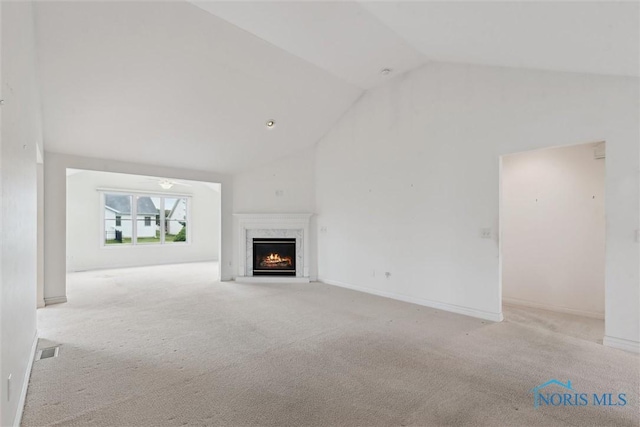 26332 Whitewater Dr, Perrysburg, OH 43551 - unfurnished living room with a premium fireplace, carpet flooring, high vaulted ceiling, and a ceiling fan