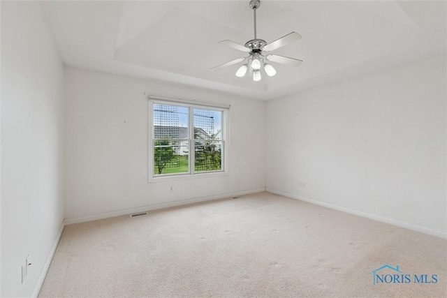26332 Whitewater Dr, Perrysburg, OH 43551 - carpeted spare room with a raised ceiling and ceiling fan