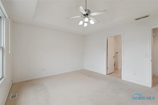 26332 Whitewater Dr, Perrysburg, OH 43551 - spare room with light carpet and a ceiling fan