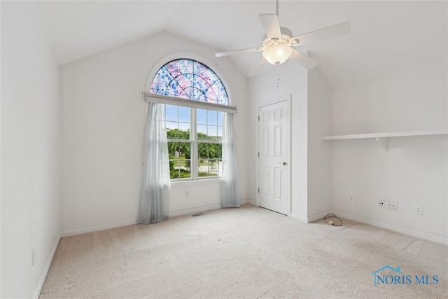 26332 Whitewater Dr, Perrysburg, OH 43551 - unfurnished bedroom featuring carpet, vaulted ceiling, and ceiling fan