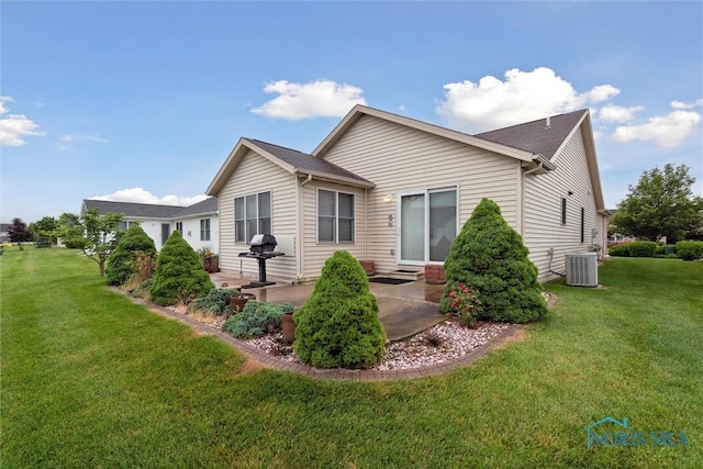 26332 Whitewater Dr, Perrysburg, OH 43551 - rear view of property featuring a patio area and a lawn