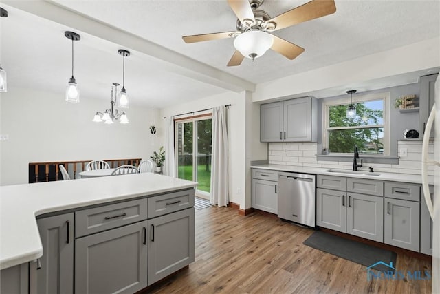 824 Edgehill Rd, Findlay, OH 45840 - kitchen featuring dishwasher, gray cabinets, tasteful backsplash, wood finished floors, and light countertops