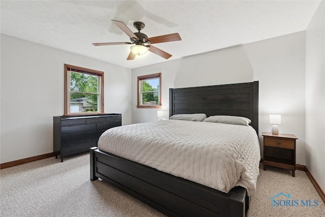 824 Edgehill Rd, Findlay, OH 45840 - bedroom with light carpet and ceiling fan