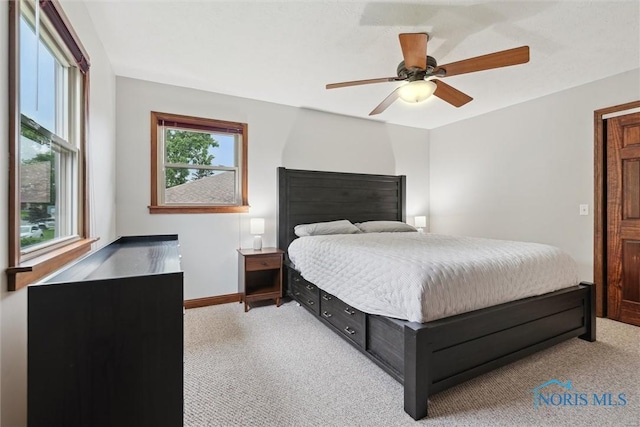 824 Edgehill Rd, Findlay, OH 45840 - bedroom with light colored carpet and a ceiling fan