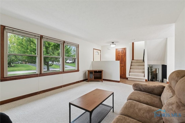 824 Edgehill Rd, Findlay, OH 45840 - living area featuring light colored carpet and stairs
