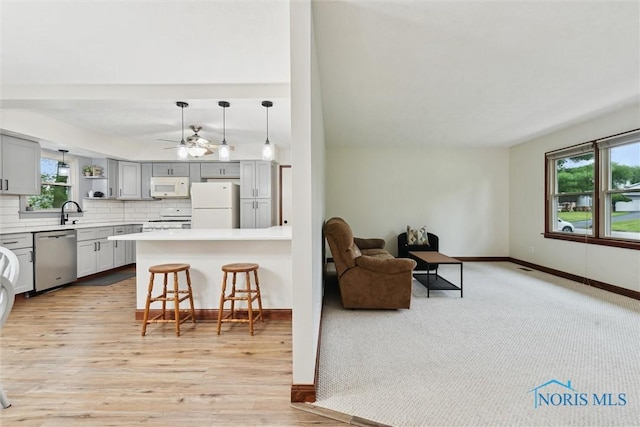 824 Edgehill Rd, Findlay, OH 45840 - living room with healthy amount of natural light, light wood-style flooring, and ceiling fan