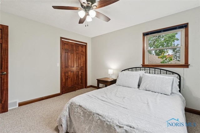 824 Edgehill Rd, Findlay, OH 45840 - carpeted bedroom with baseboards and a ceiling fan