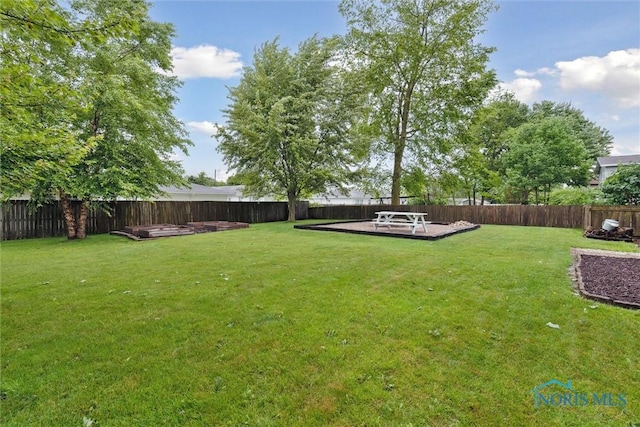 824 Edgehill Rd, Findlay, OH 45840 - fenced backyard with a wooden deck