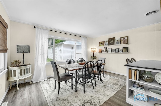 550 W 2nd St, Perrysburg, OH 43551 - dining room with wood finished floors and crown molding