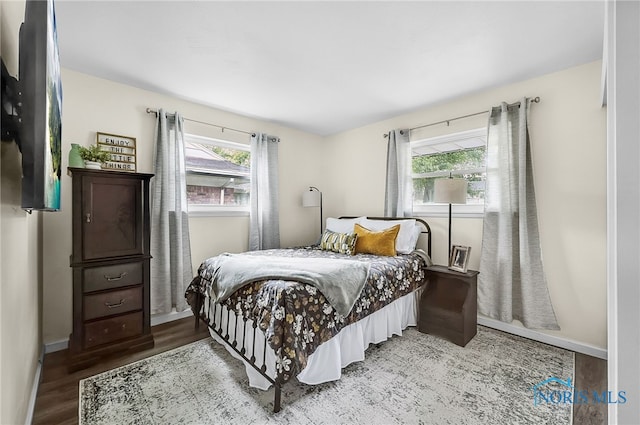 550 W 2nd St, Perrysburg, OH 43551 - bedroom featuring wood finished floors and multiple windows