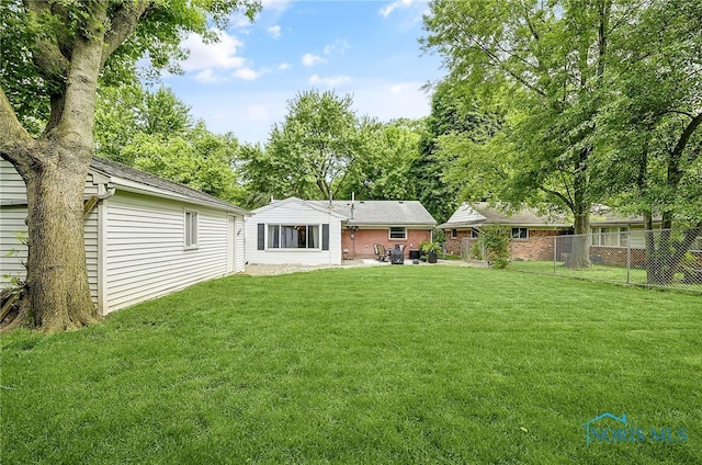550 W 2nd St, Perrysburg, OH 43551 - rear view of house featuring a patio