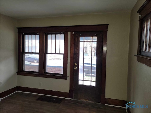 728 Ashwood Ave, Toledo, OH 43608 - foyer featuring wood finished floors and plenty of natural light
