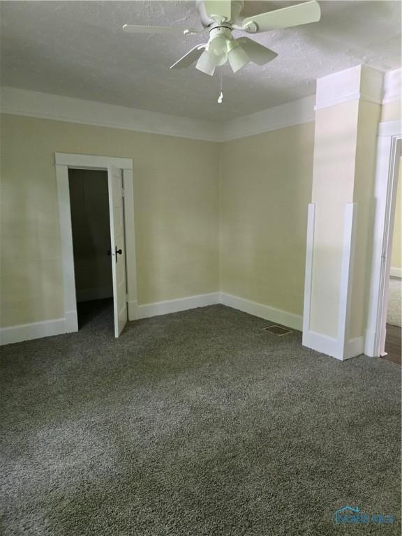 1019 Wayne Ave, Defiance, OH 43512 - unfurnished room featuring dark carpet and ceiling fan