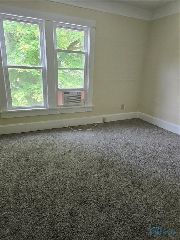 1019 Wayne Ave, Defiance, OH 43512 - carpeted spare room with cooling unit and baseboards