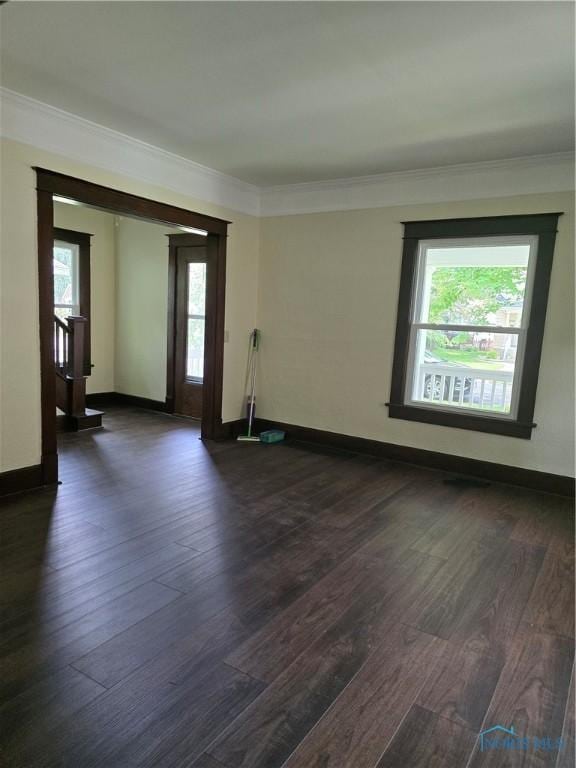 1019 Wayne Ave, Defiance, OH 43512 - empty room with ornamental molding and dark wood-style floors
