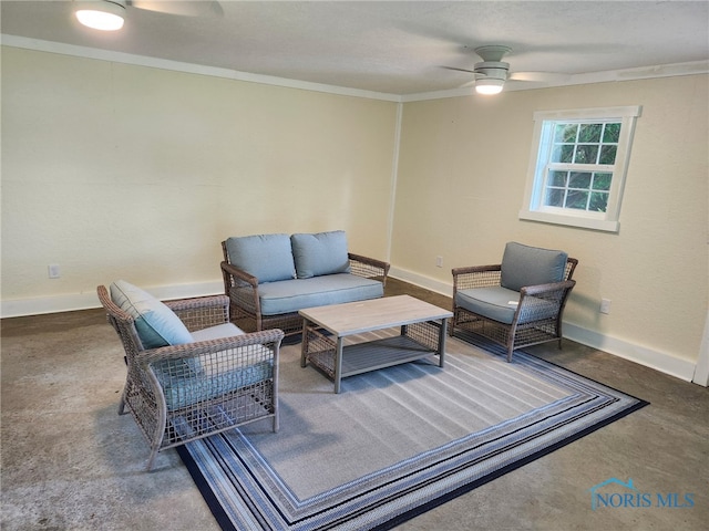 1019 Wayne Ave, Defiance, OH 43512 - sitting room with a ceiling fan, ornamental molding, and concrete flooring